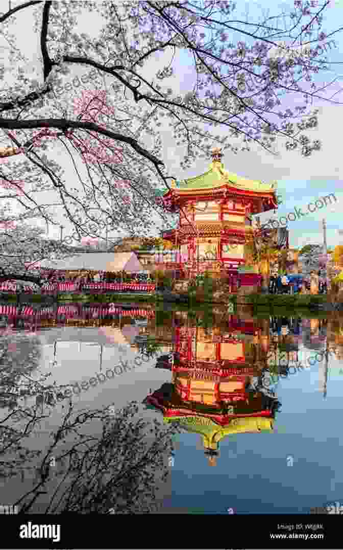 A Vibrant Display Of Cherry Blossoms Framing The Iconic Bentendo Temple In Ueno Park. Japan Sakura Chidorigafuchi 2024: Cherry Blossoms In Tokyo (Japan Photo 20)