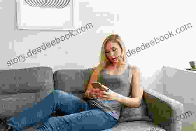 A Woman Sitting On A Couch, Looking At Her Phone. City Of Likes Jenny Mollen